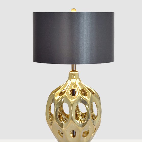 modern-ceramic-table-lamp-with-hollow-design-and-fabric-drum-shade-for-elegant-interior-lighting-decor