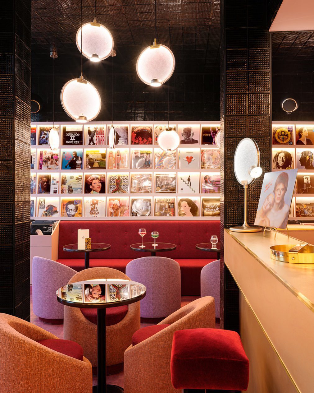 modern-circular-glass-pendant-light-with-brass-finish-and-integrated-led-spotlight