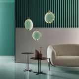 modern-circular-glass-pendant-light-with-brass-finish-and-integrated-led-spotlight