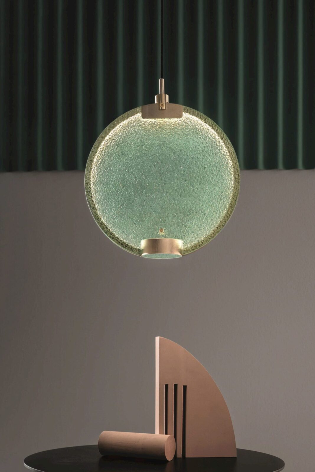 modern-circular-glass-pendant-light-with-brass-finish-and-integrated-led-spotlight