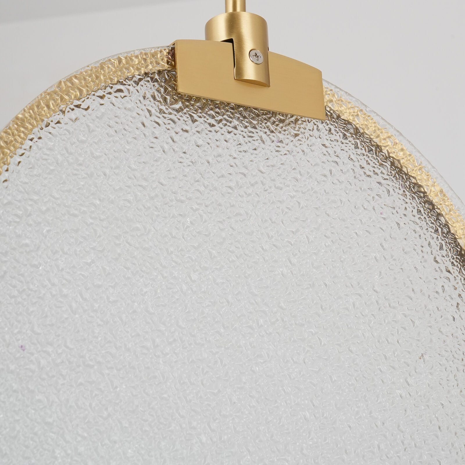modern-circular-glass-pendant-light-with-brass-finish-and-integrated-led-spotlight