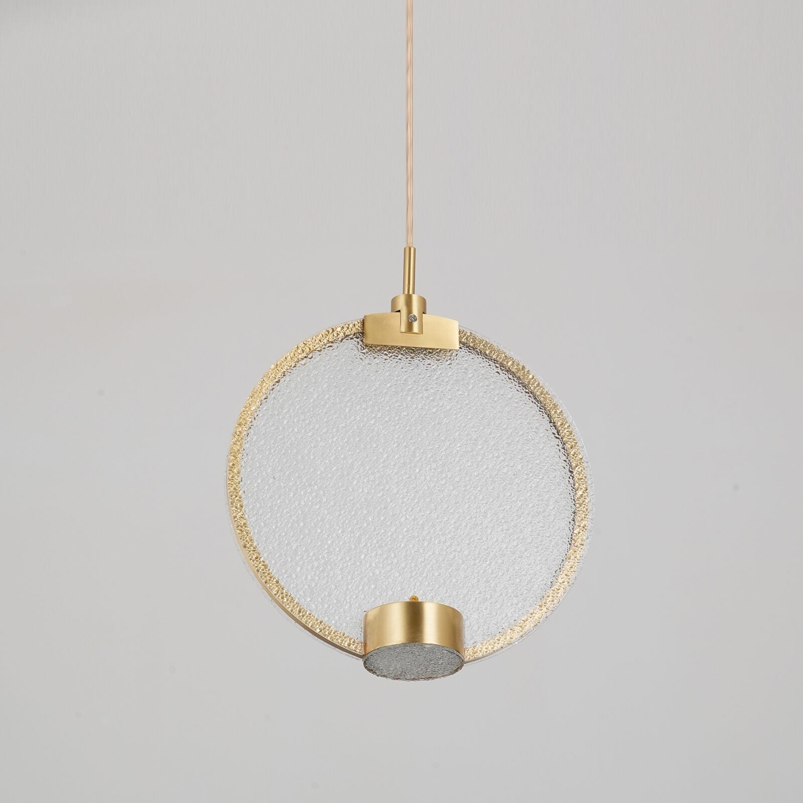 modern-circular-glass-pendant-light-with-brass-finish-and-integrated-led-spotlight