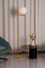 modern-industrial-gold-standing-lamp-with-white-glass-globe-shade-and-foot-switch