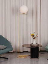 modern-industrial-gold-standing-lamp-with-white-glass-globe-shade-and-foot-switch