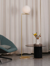 modern-industrial-gold-standing-lamp-with-white-glass-globe-shade-and-foot-switch