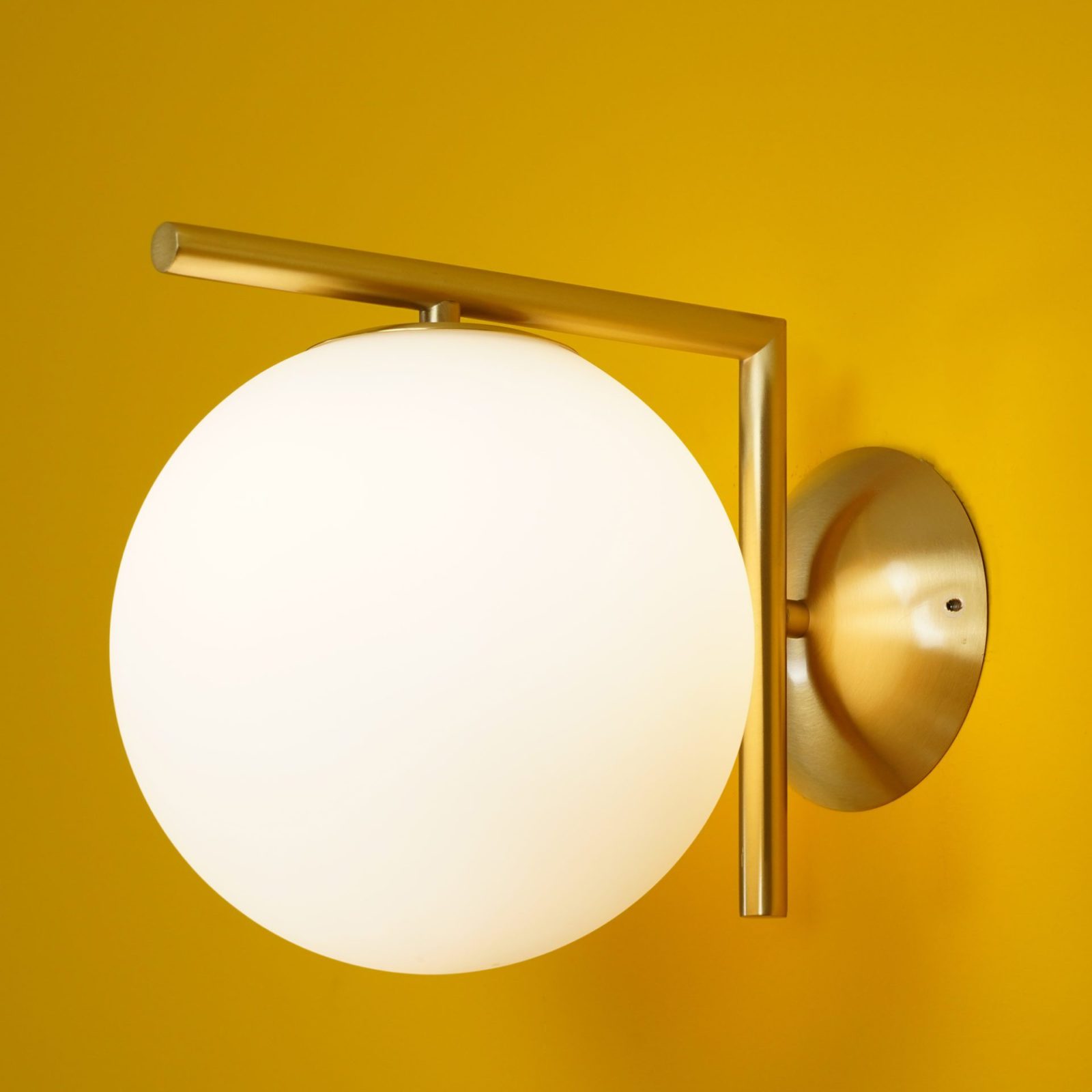 modern-opal-blown-glass-wall-sconce-with-elegant-brass-finish-round-globe-lighting