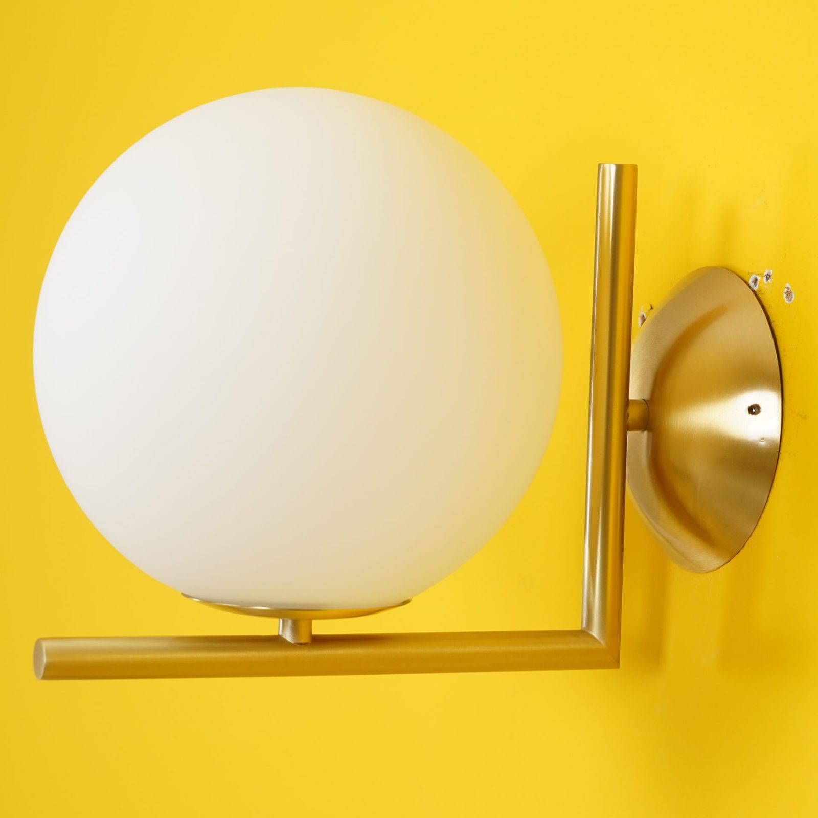 modern-opal-blown-glass-wall-sconce-with-elegant-brass-finish-round-globe-lighting