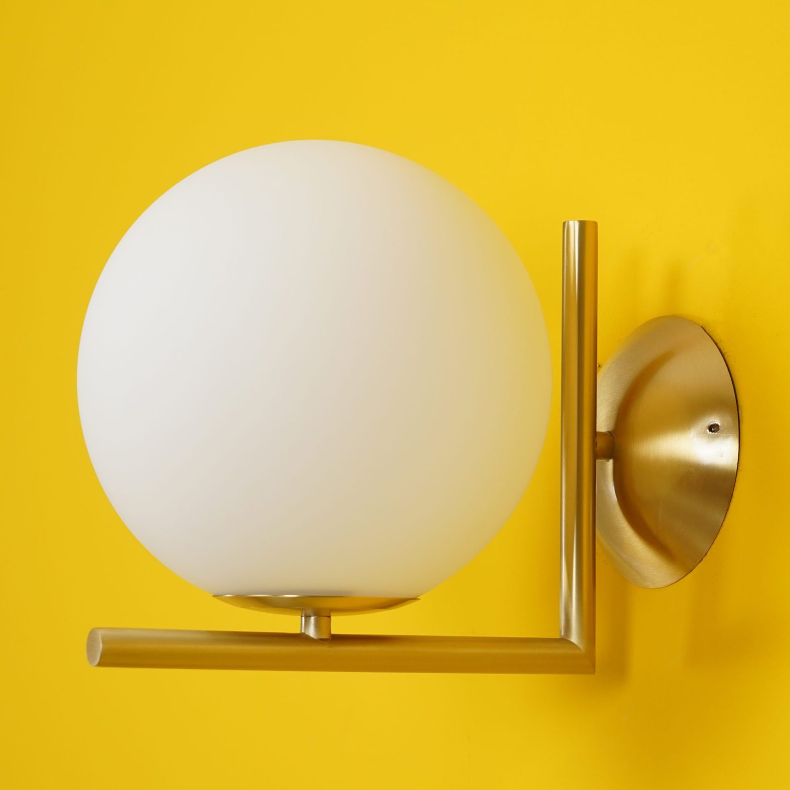 modern-opal-blown-glass-wall-sconce-with-elegant-brass-finish-round-globe-lighting