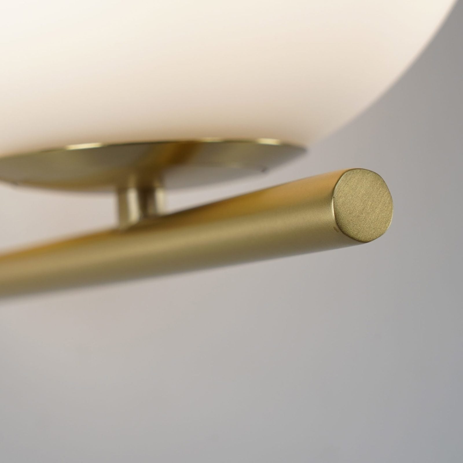 modern-opal-blown-glass-wall-sconce-with-elegant-brass-finish-round-globe-lighting