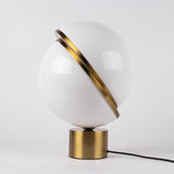 modern-asymmetrical-crescent-table-lamp-with-gold-interior-and-acrylic-globe