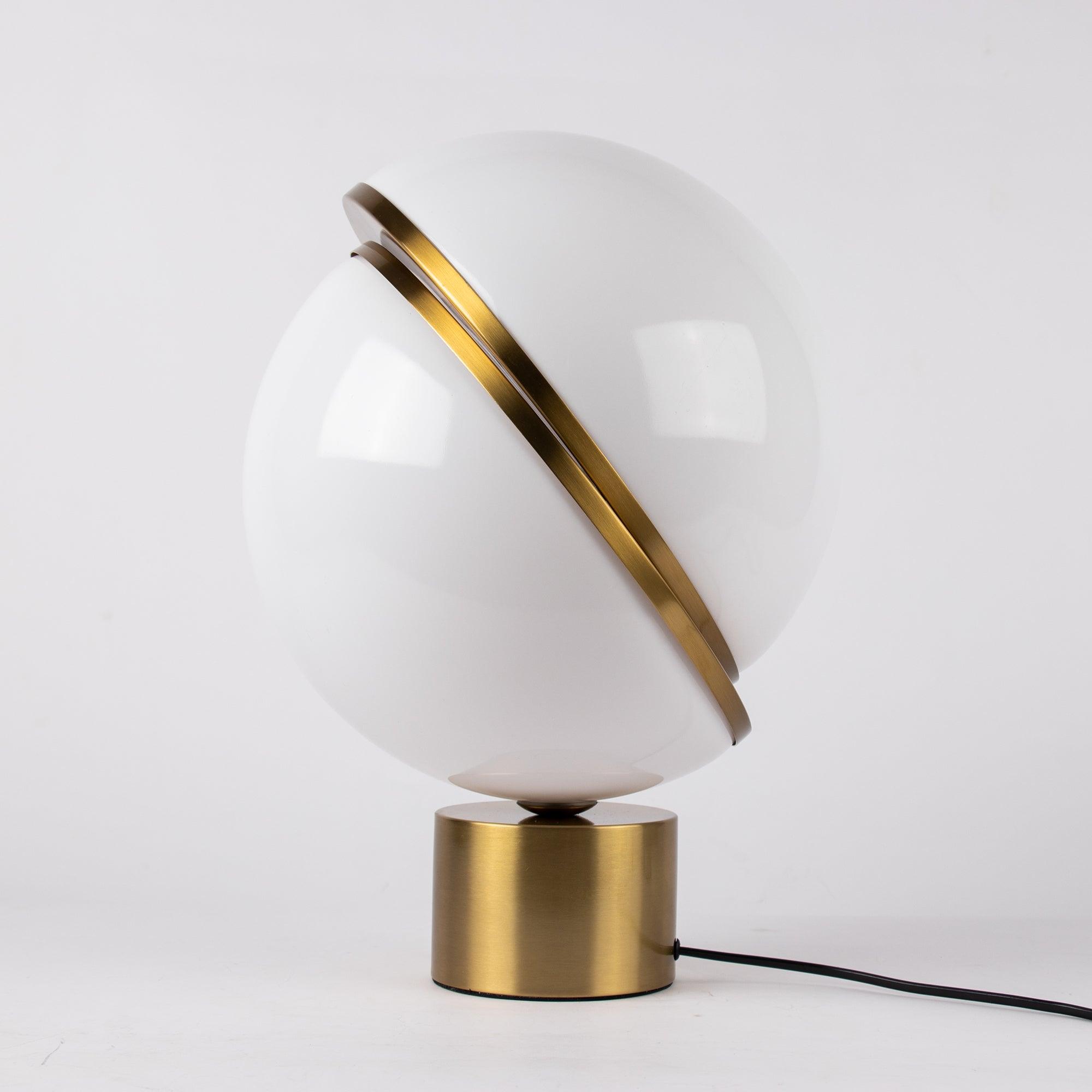 modern-asymmetrical-crescent-table-lamp-with-gold-interior-and-acrylic-globe