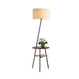 modern-inclined-wood-floor-lamp-with-fabric-shade-and-integrated-side-table