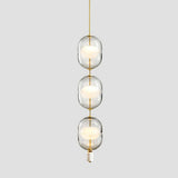 inder-nordic-glass-capsule-pendant-light-with-white-marble-and-metal-accents