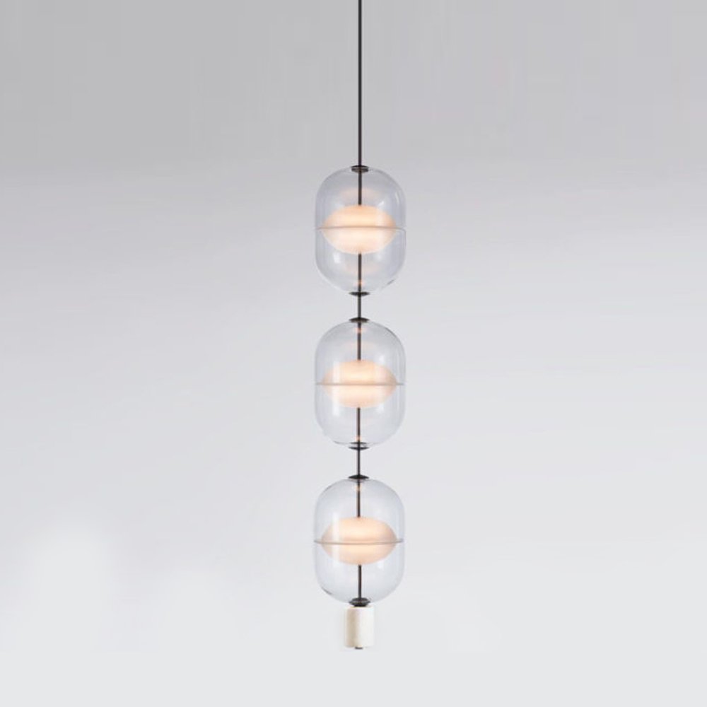 inder-nordic-glass-capsule-pendant-light-with-white-marble-and-metal-accents