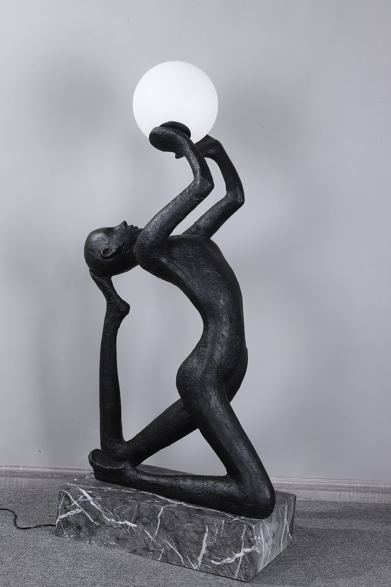 modern-artistic-human-figure-floor-lamp-with-luminous-glass-globe-sphere