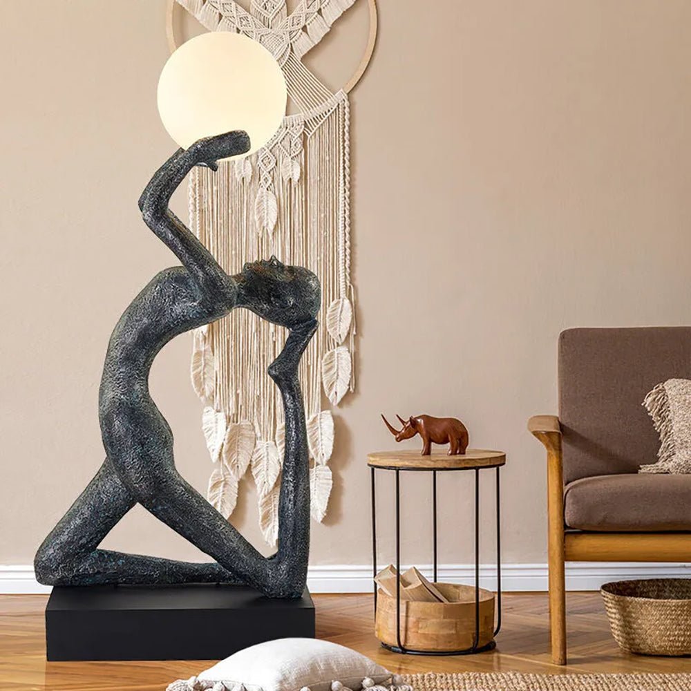 modern-artistic-human-figure-floor-lamp-with-luminous-glass-globe-sphere
