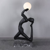 modern-artistic-human-figure-floor-lamp-with-luminous-glass-globe-sphere