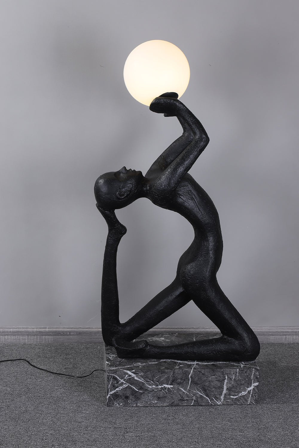 modern-artistic-human-figure-floor-lamp-with-luminous-glass-globe-sphere