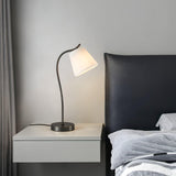 Modern Brass and Black Table Lamp with White Fabric Shade for Bedside Table