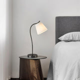 Modern Brass and Black Table Lamp with White Fabric Shade for Bedside Table