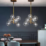 modern-glass-bubble-chandelier-with-burnished-brass-finish-and-led-integrated-lighting