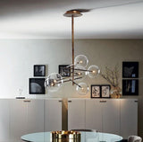 modern-glass-bubble-chandelier-with-burnished-brass-finish-and-led-integrated-lighting