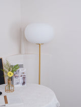 Modern Jwda Travertine Floor Lamp with Spherical Glass Globe and Yellow Stone Base