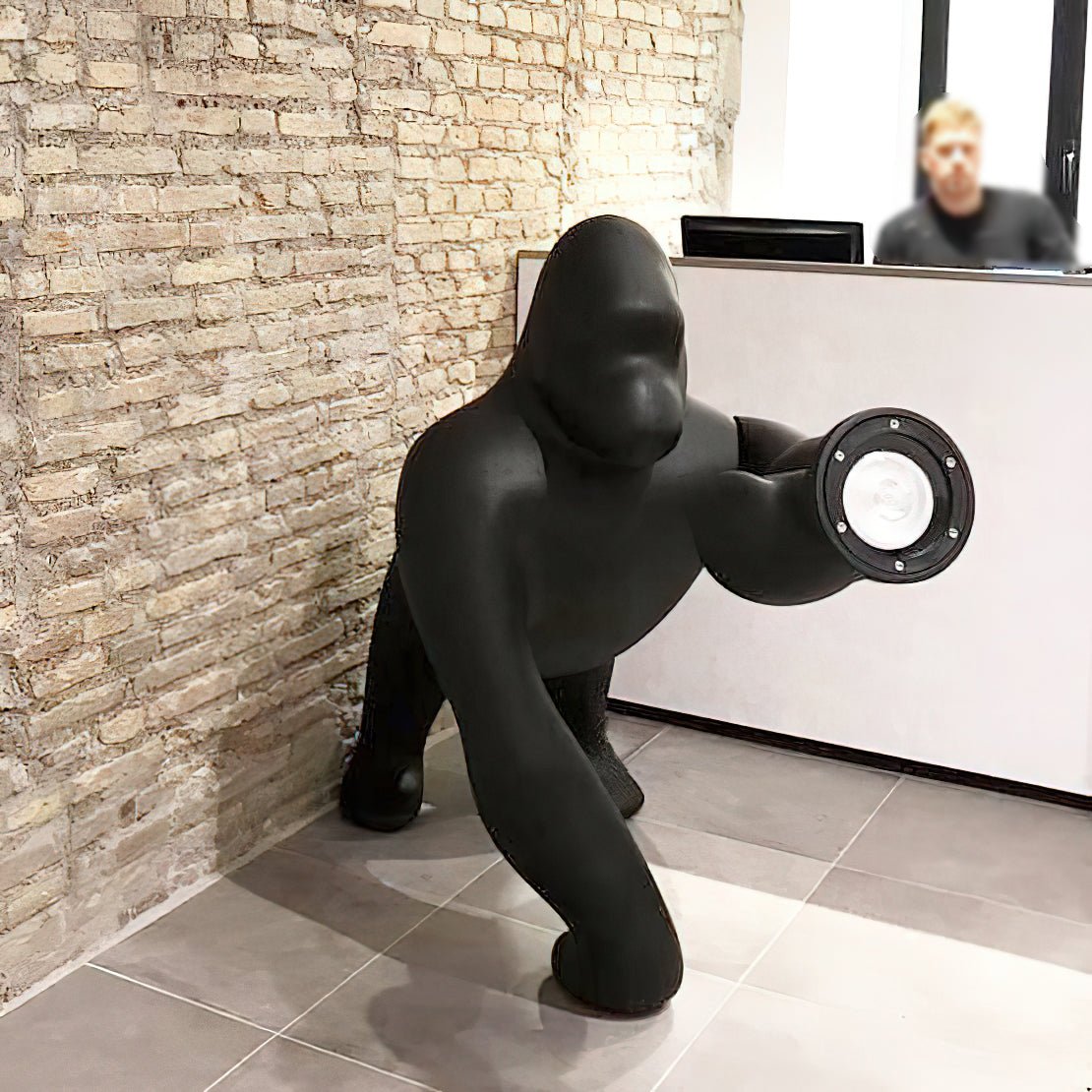 Modern Kong Figurative Monkey Floor Lamp with Adjustable Arm and Matte Black Finish