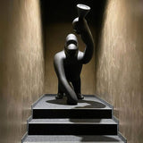 Modern Kong Figurative Monkey Floor Lamp with Adjustable Arm and Matte Black Finish
