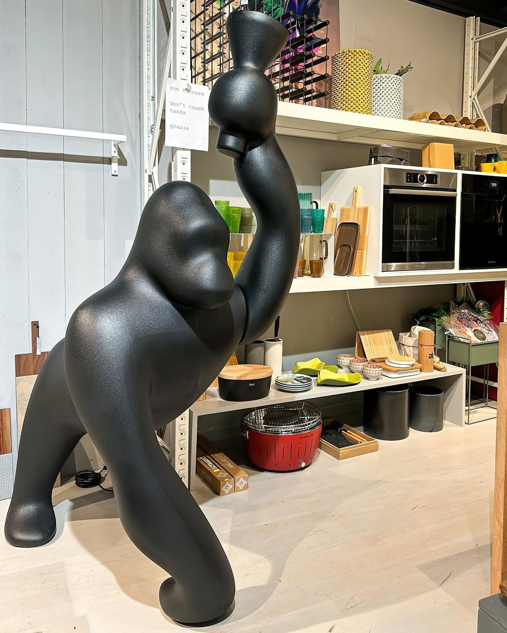 Modern Kong Figurative Monkey Floor Lamp with Adjustable Arm and Matte Black Finish