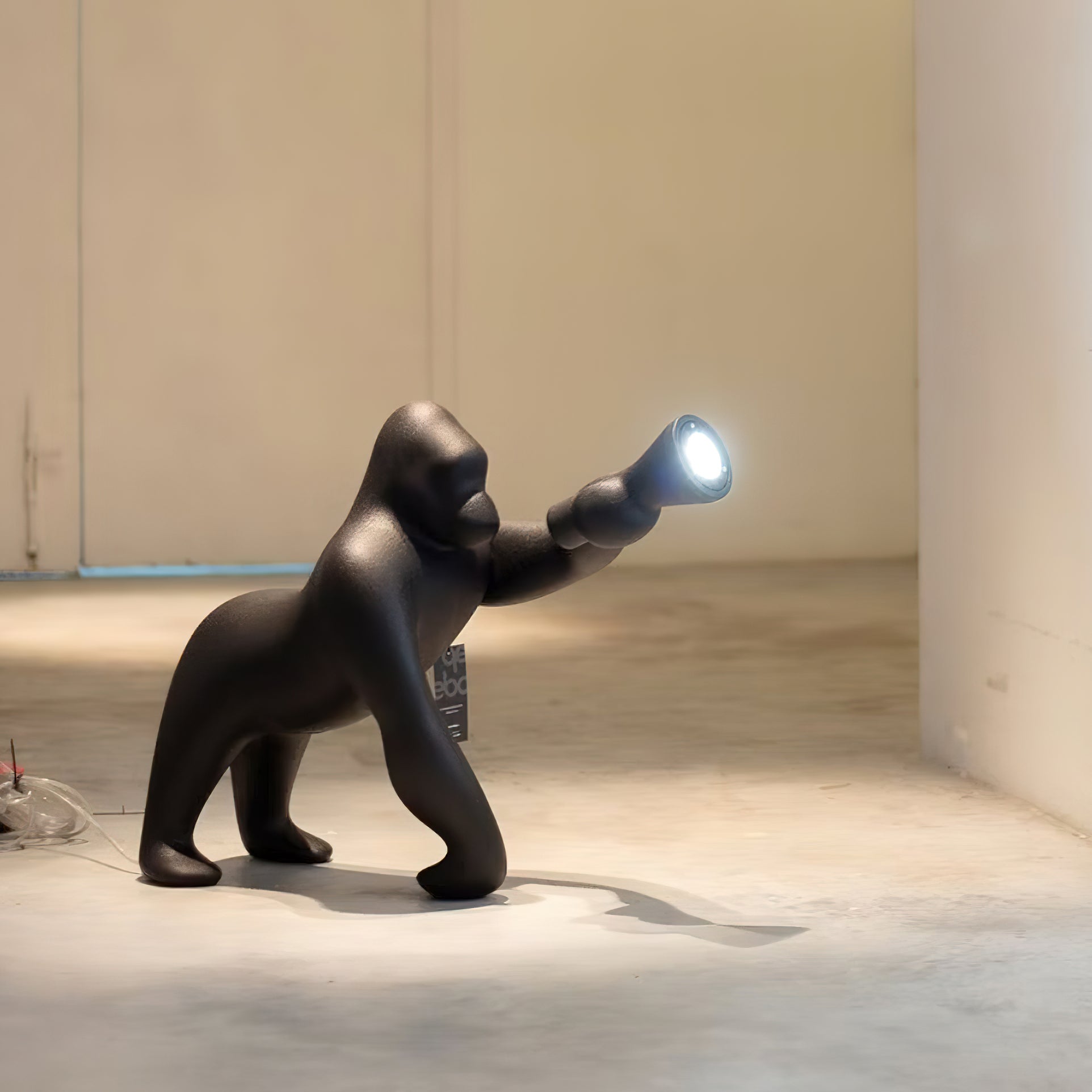 Modern Kong Figurative Monkey Floor Lamp with Adjustable Arm and Matte Black Finish