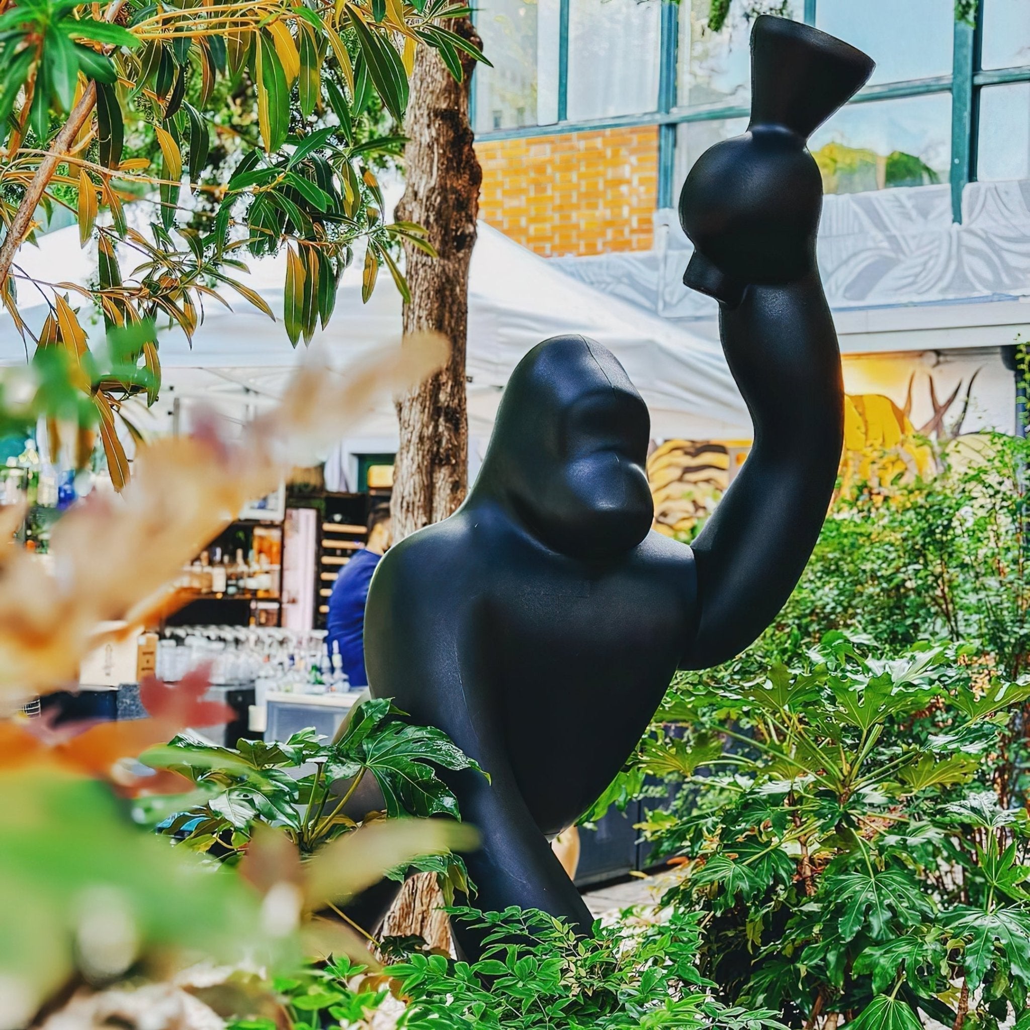 Modern Kong Figurative Monkey Floor Lamp with Adjustable Arm and Matte Black Finish