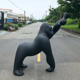 Modern Kong Figurative Monkey Floor Lamp with Adjustable Arm and Matte Black Finish