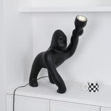 Modern Kong Figurative Monkey Floor Lamp with Adjustable Arm and Matte Black Finish