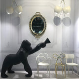 Modern Kong Figurative Monkey Floor Lamp with Adjustable Arm and Matte Black Finish
