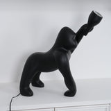 Modern Kong Figurative Monkey Floor Lamp with Adjustable Arm and Matte Black Finish