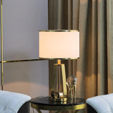 Laila Antique Gold Table Lamp with Ivory Fabric Shade and Curved Metal Base