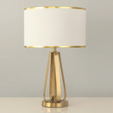 Laila Antique Gold Table Lamp with Ivory Fabric Shade and Curved Metal Base