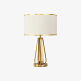 Laila Antique Gold Table Lamp with Ivory Fabric Shade and Curved Metal Base