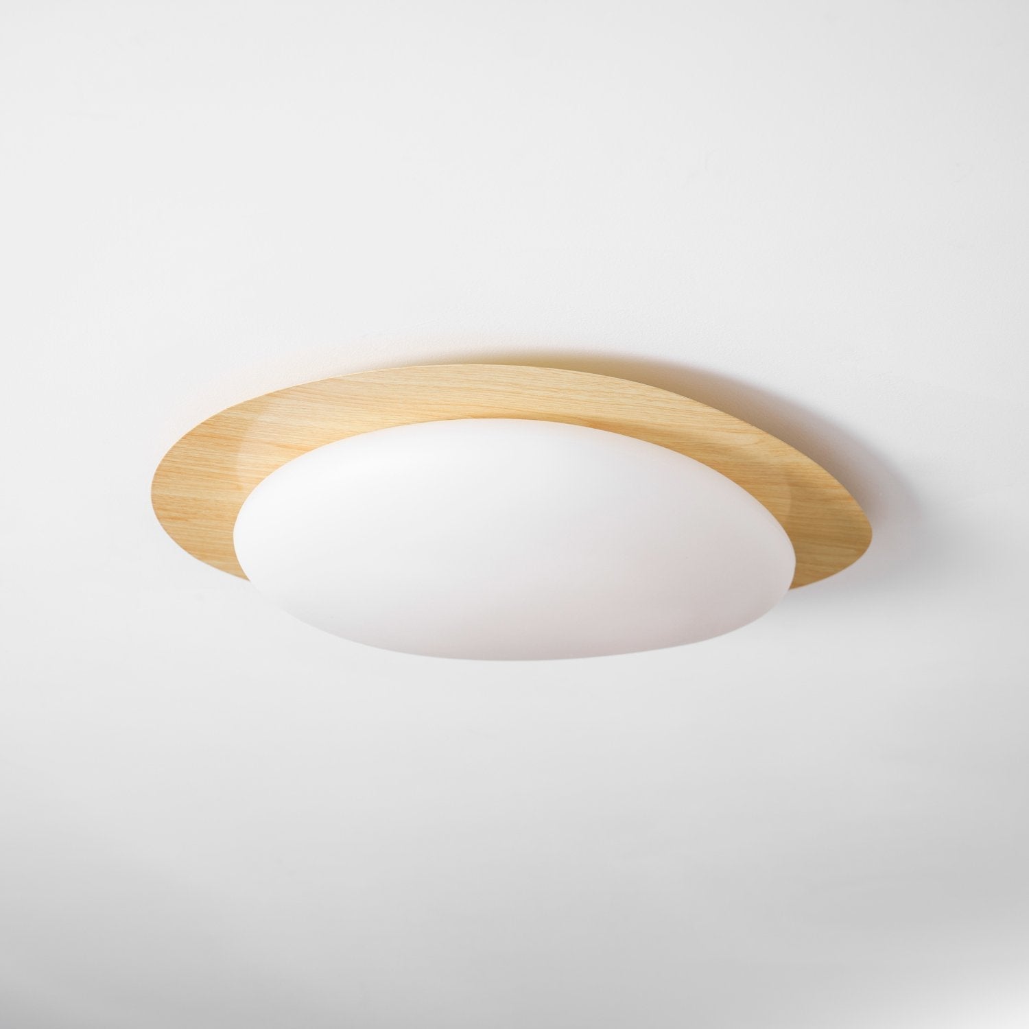 modern-pebble-shape-wood-grain-led-ceiling-light-for-contemporary-home-interiors