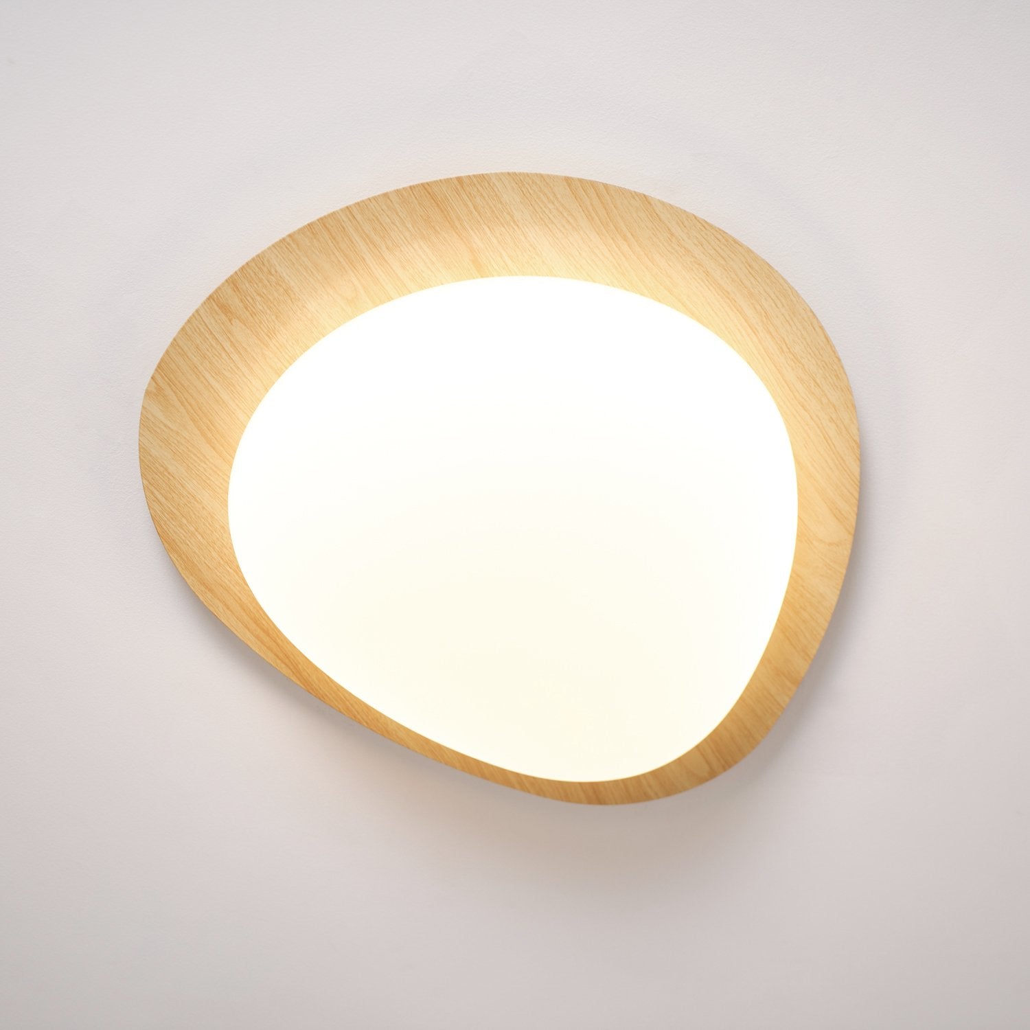 modern-pebble-shape-wood-grain-led-ceiling-light-for-contemporary-home-interiors