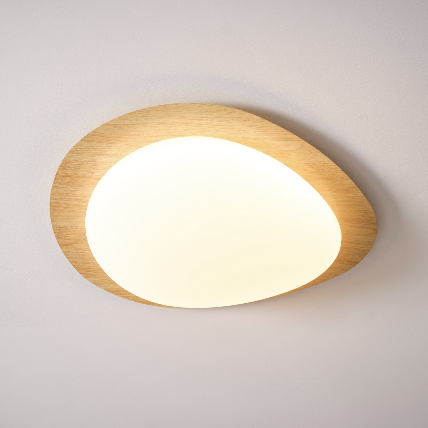 modern-pebble-shape-wood-grain-led-ceiling-light-for-contemporary-home-interiors