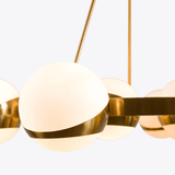 modern-brass-sputnik-chandelier-with-opaline-glass-spheres-for-dining-room
