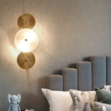 modern-gold-dual-disc-wall-sconce-with-frosted-glass-shade-and-mid-century-art-deco-design