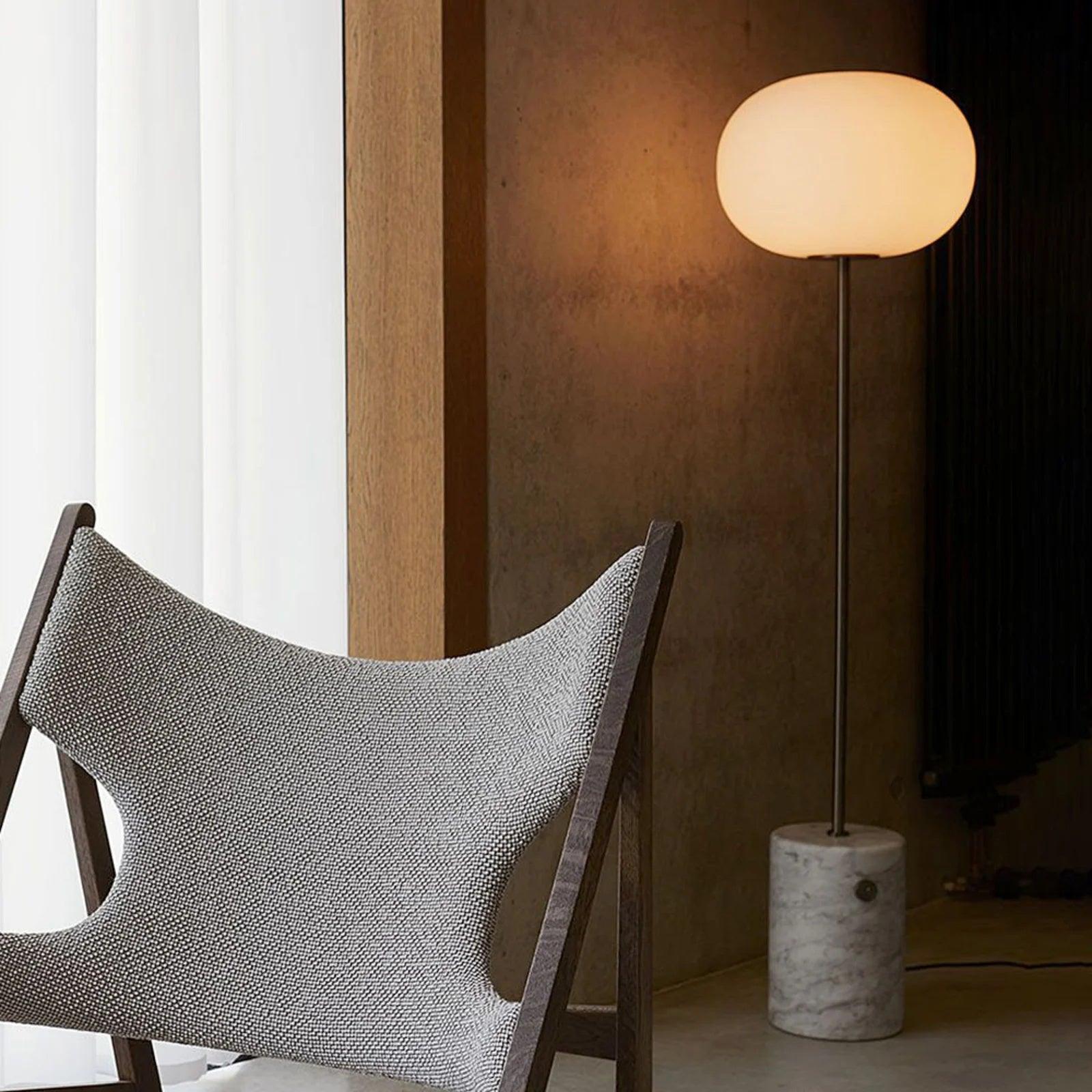 Modern Jwda Travertine Floor Lamp with Spherical Glass Globe and Yellow Stone Base