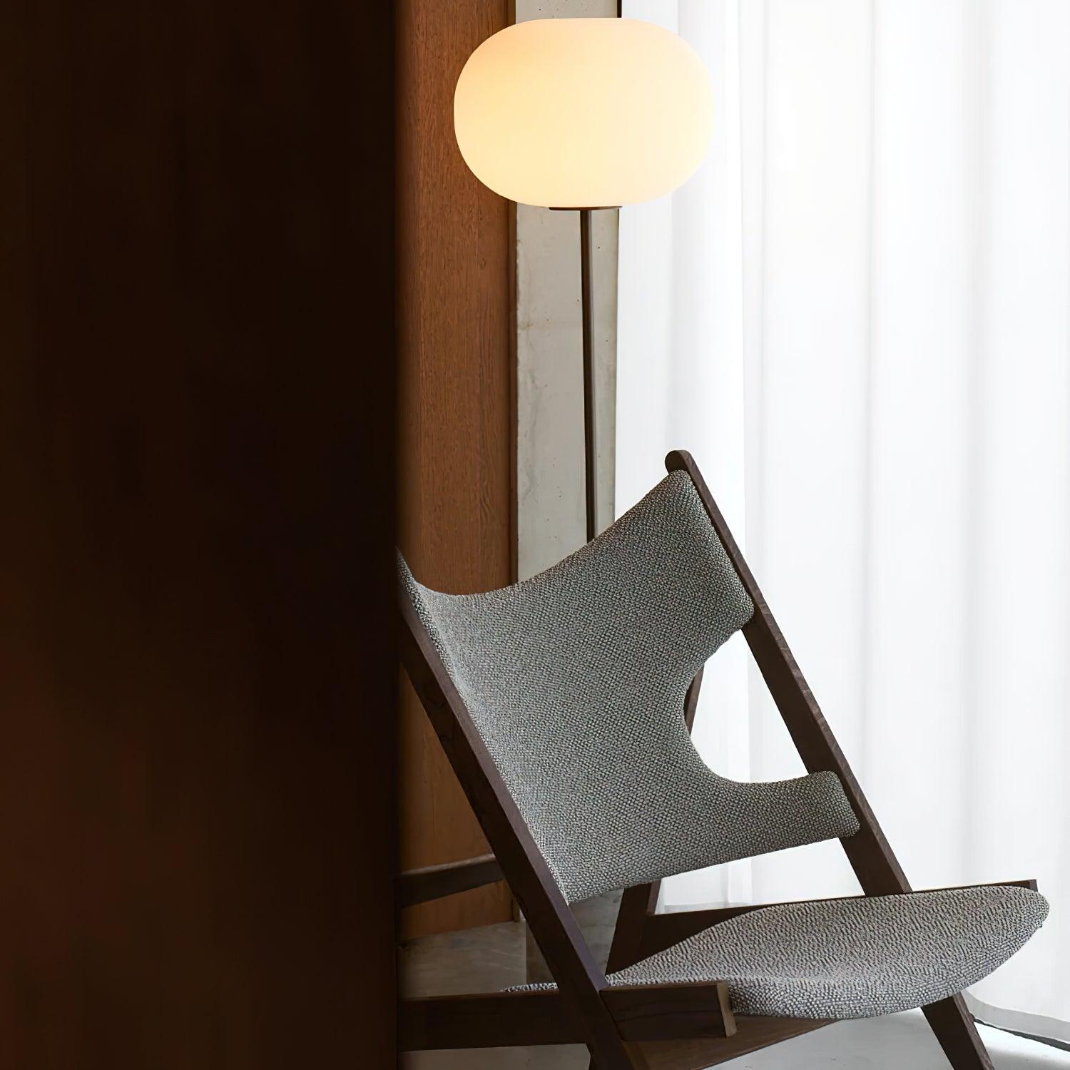 Modern Jwda Travertine Floor Lamp with Spherical Glass Globe and Yellow Stone Base