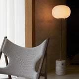 Modern Jwda Travertine Floor Lamp with Spherical Glass Globe and Yellow Stone Base