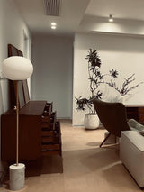 Modern Jwda Travertine Floor Lamp with Spherical Glass Globe and Yellow Stone Base