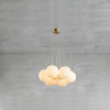 luxury-lunar-alabaster-sphere-chandelier-modern-multi-ball-hanging-light-fixture-gold-finish