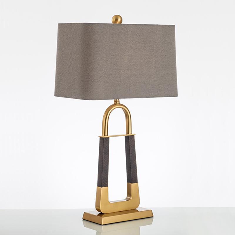 elegant-leather-texture-table-lamp-with-gold-metal-base-and-linen-shade